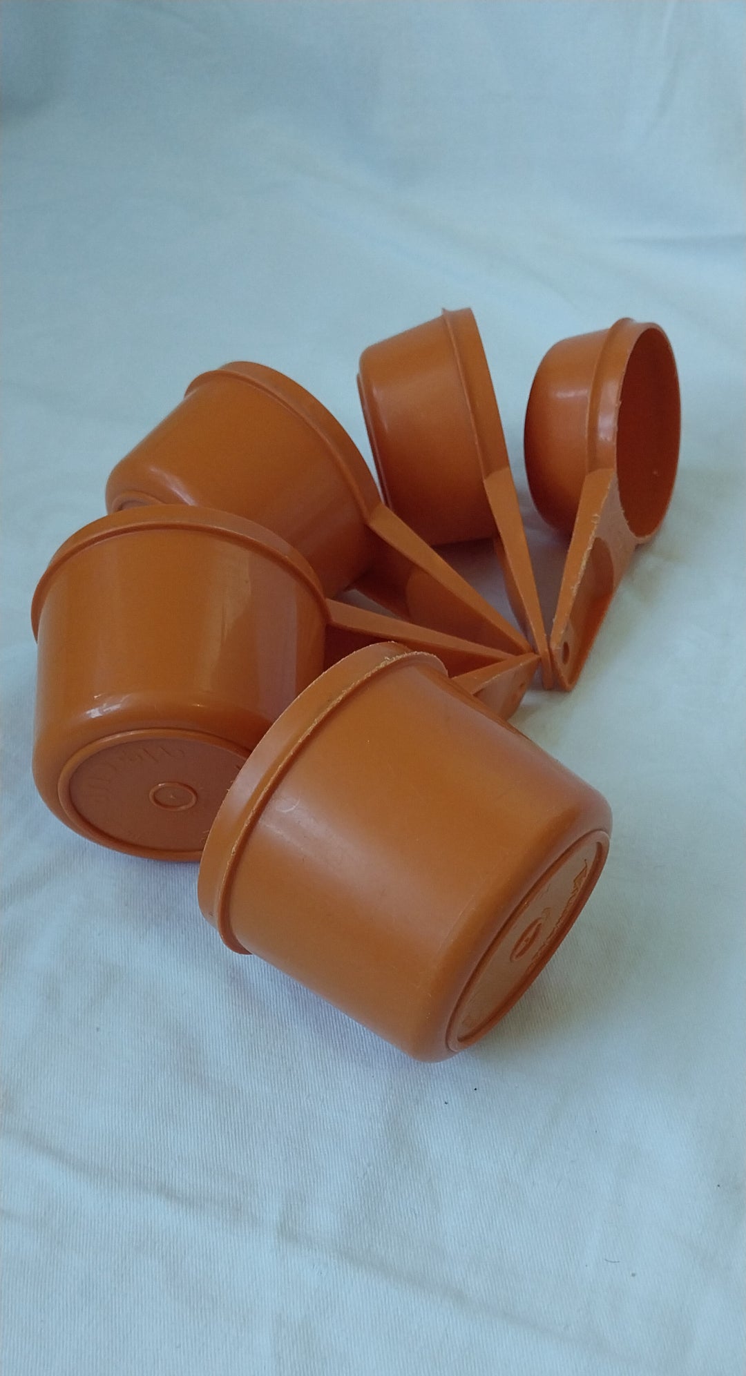 Vintage Tupperware Orange Measuring Cups