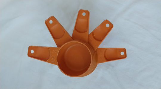 Vintage Tupperware Orange Measuring Cups